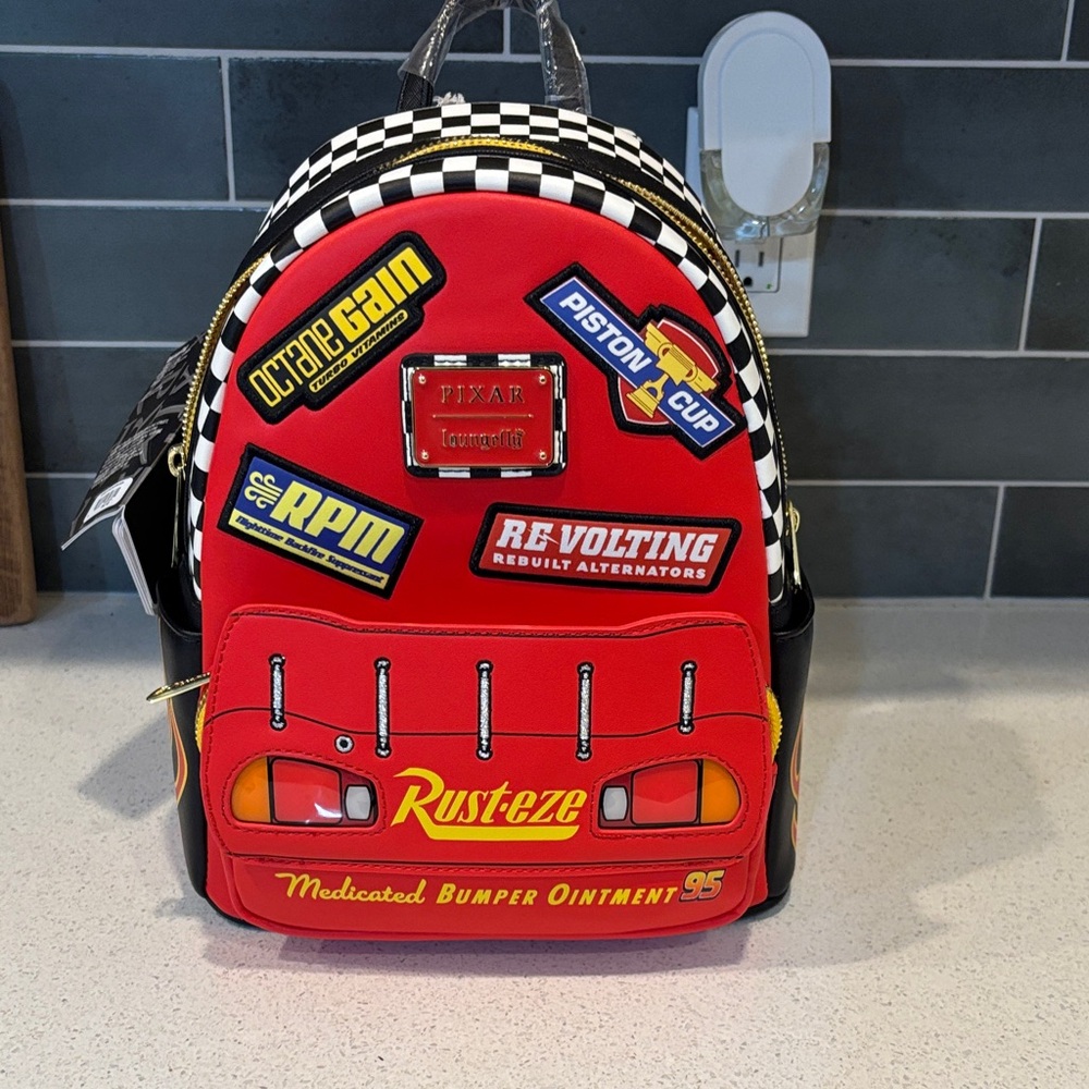 Loungefly Red Pixar 'Rust-Eze' Patch Mini Backpack - image 1